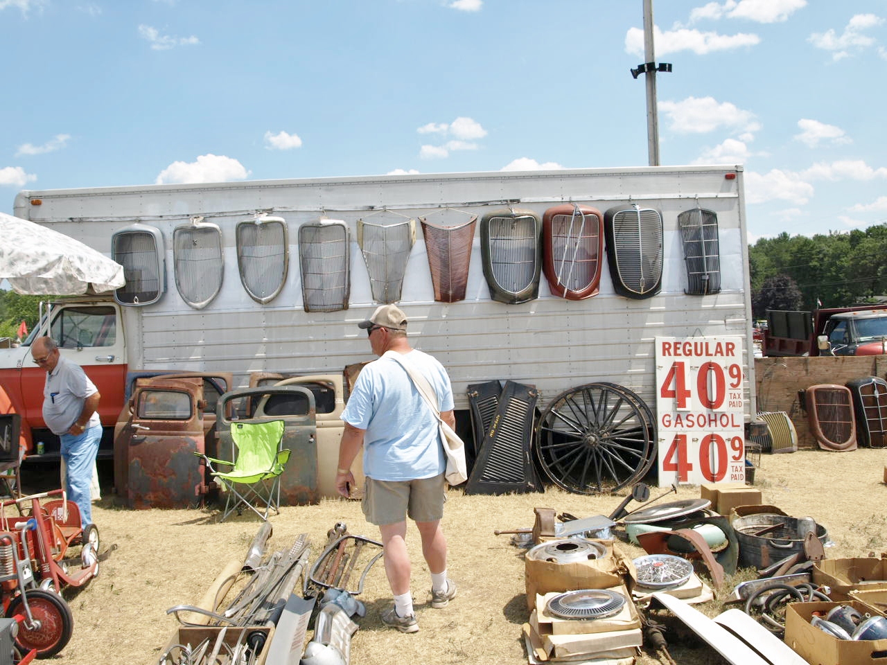 Go Poverty Flats 2012 Iola, Wisconsin Swap Meet featuring old car