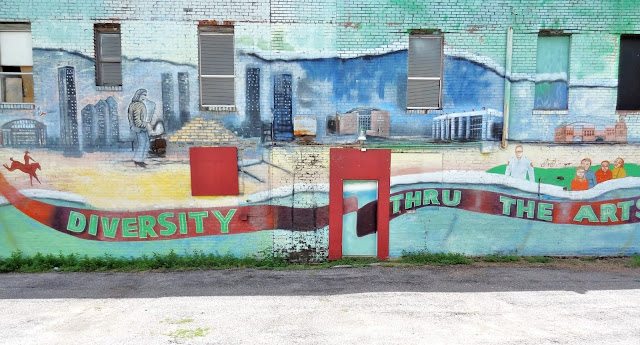 Panoramic View of Diversity thru the Arts mural on the North-facing wall of the Midtown Arts Center Panoramic View of Diversity thru the Arts mural on the North-facing wall of the Midtown Arts Center