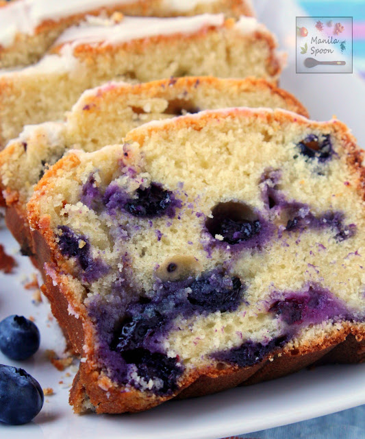Bursting with juicy blueberries, this moist and delicious Blueberry Ricotta Pound Cake is summer's perfect cake! | manilaspoon.com