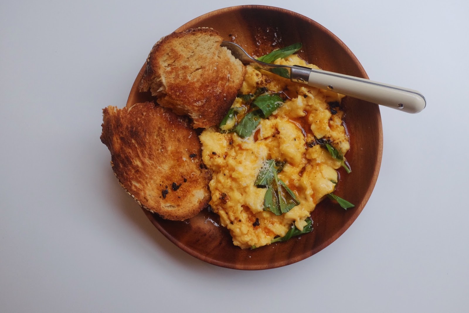 The Fluffiest Scrambled Eggs with Basil and Chipotle Butter