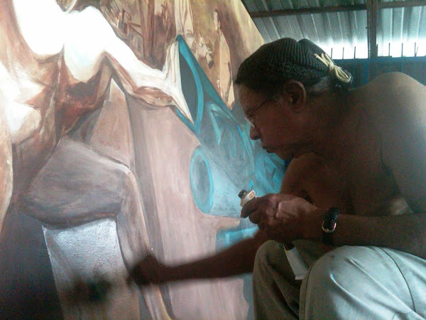 Ramón Oviedo trabajando en su mural; El Pueblo en Lucha