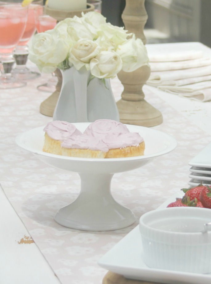 White Belgian stone pedestal with pink cupcakes - Hello Lovely Studio