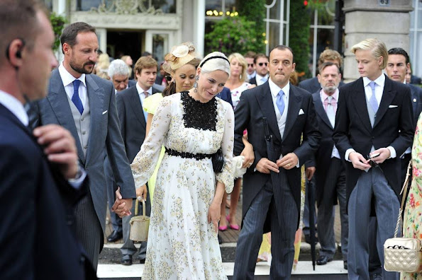 Crown Princess Mette-Marit of Norway and Crown Prince Haakon of Norway leave the Hotel Des Iles Borromees for the religious wedding ceremony of Pierre Casiraghi, Prince Albert II of Monaco's nephew, with Beatrice Borromeo 