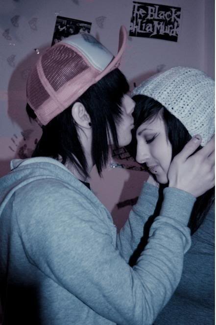 Emo boy and girl kissing