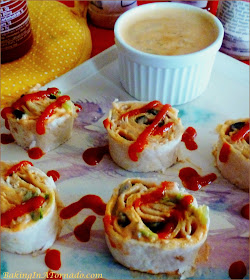 Spicy Chicken Roll Ups, little sandwich bites with a kick. Serve as an appetizer or for lunch | Recipe developed by www.BakingInATornado.com | #recipe