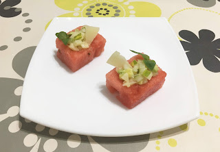 Cups of watermelon with cheese and cucumber salad