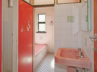 vintage 1960s bathroom with pink bath