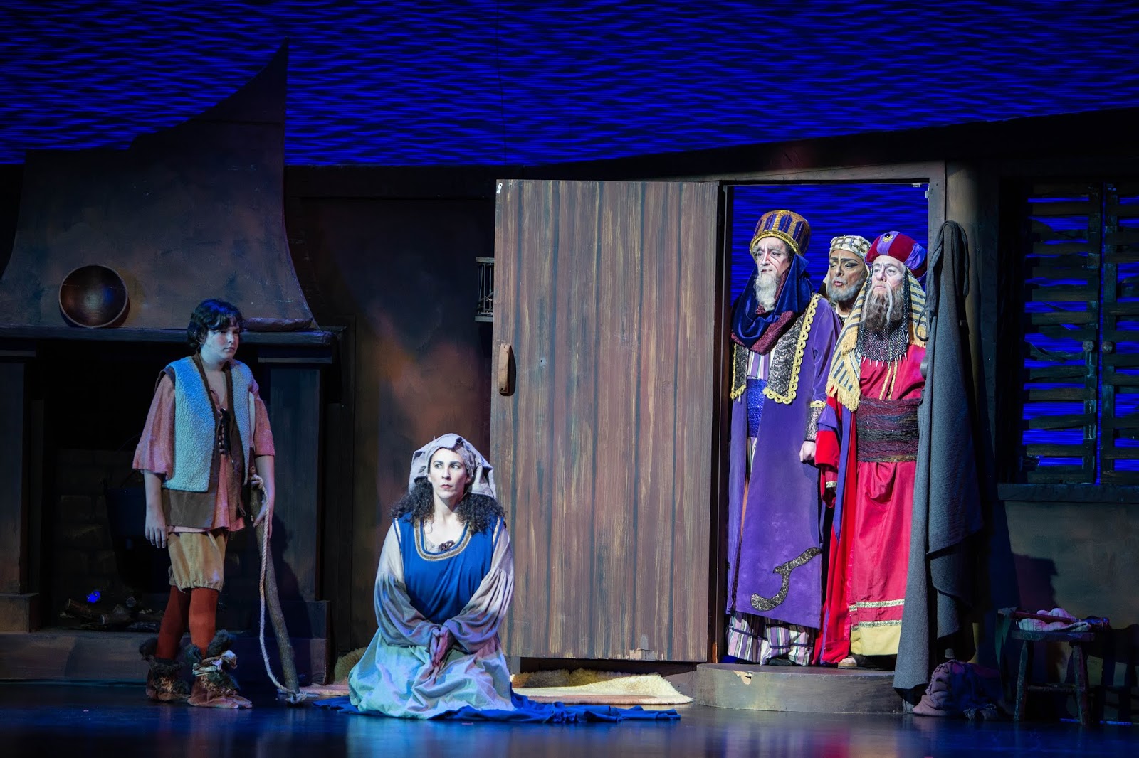IN REVIEW: (from left to right) treble PHILLIP WEBB as Amahl, mezzo-soprano STEPHANIE FOLEY DAVIS as Mother, tenor JACOB RYAN WRIGHT as Kaspar, bass-baritone DONALD HARTMANN as Balthazar, and baritone ROBERT WELLS as Melchior in Greensboro Opera's December 2019 production of Gian Carlo Menotti's AMAHL AND THE NIGHT VISITORS [Photograph by VanderVeen Photographers, © by Greensboro Opera]