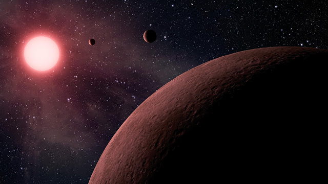 Artist's impression of the star KOI-961 and its three planets
