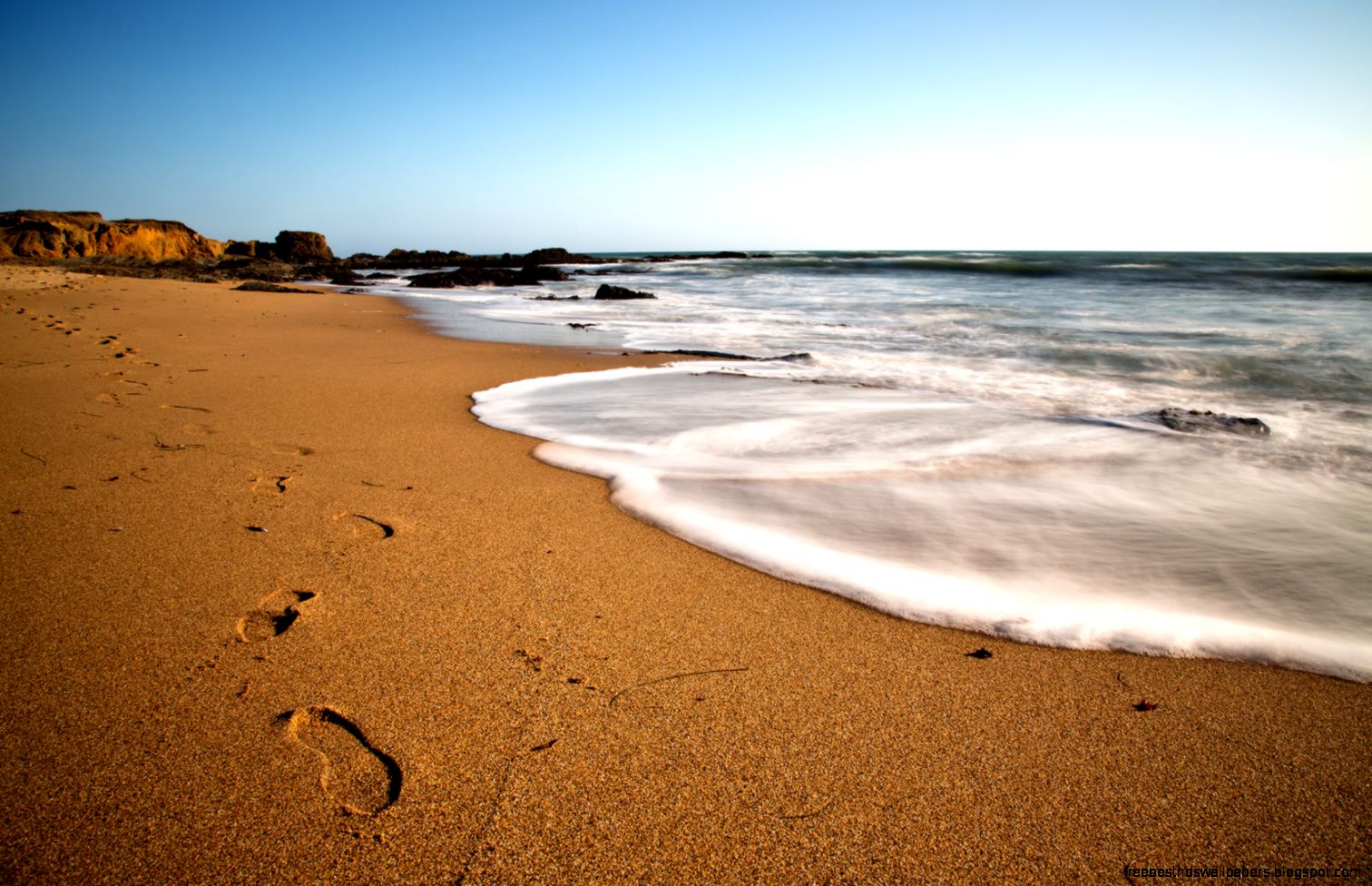 Footprints on the beach  1680 x 1050  Nature  Photography
