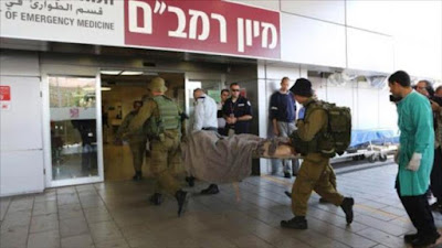 Terroristas sirios ingresando en un hospital del régimen de Israel para ser atendidos