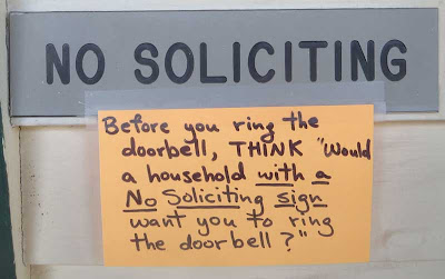 No soliciting sign with added note that says Before you ring this bell, think to yourself, 'Would a household with a no soliciting sign want you to ring this bell?'