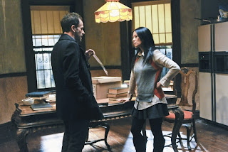 Jonny Lee Miller as Sherlock Holmes and Lucy Liu as Joan Watson in Elementary Episode # 12 M