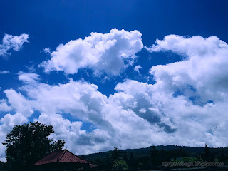 White Cumulus Clouds On Sunny Day At Labuhan Aji, Temukus Village, North Bali, Indonesia