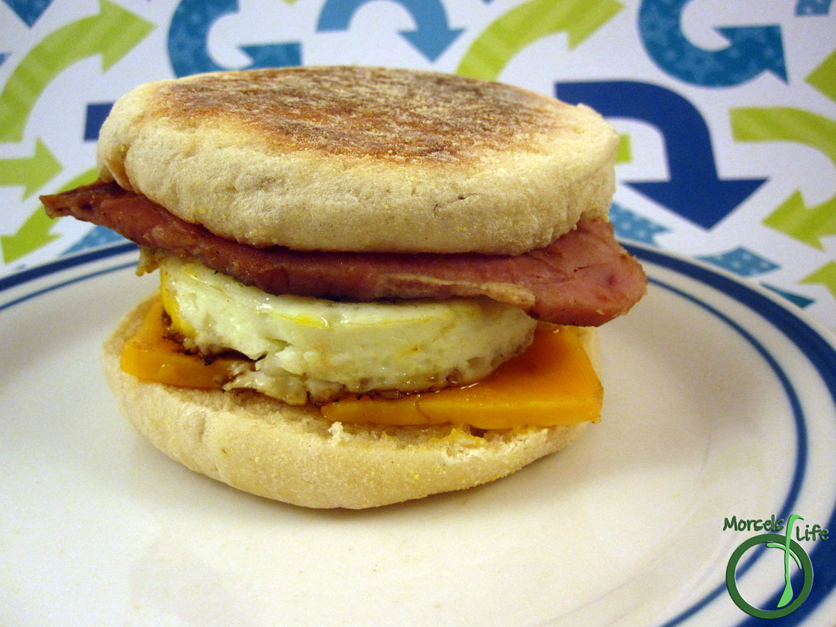 Morsels of Life - DIY Egg McMuffin - Layer some cheese, a griddle fried egg, and some ham between some toasted English muffins to make your own Egg McMuffin.