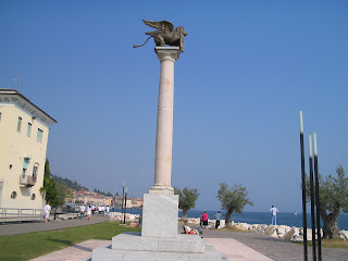 The Venetian column with its winged lion of St Mark on the waterfront of Salò on Lake Garda