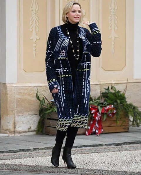 Prince Albert II, Princess Charlene, Louis Ducruet and Camille Gottlieb attended Children's Christmas ceremony