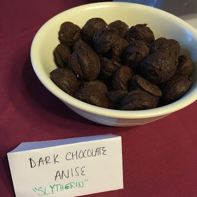 white bowl full of dark chocolate cookies