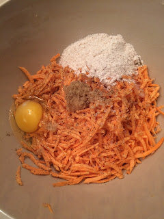 bowl of shredded sweet potato with egg and flour added 