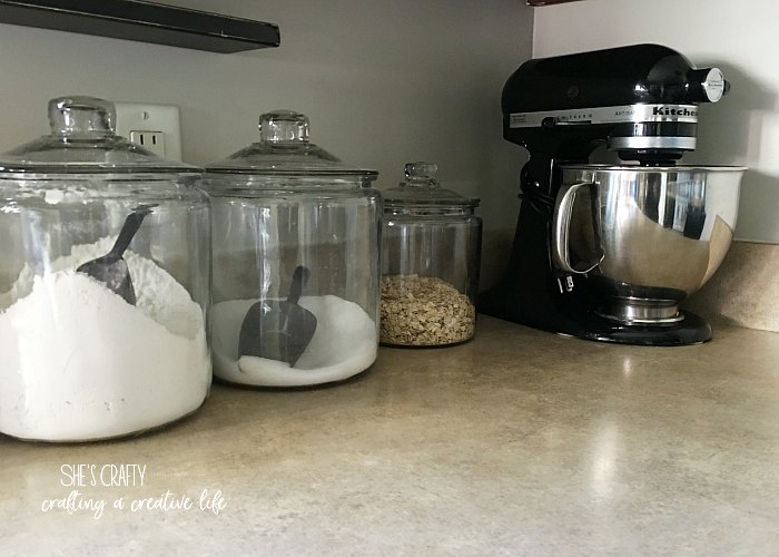 kitchen aid mixer, jars, baking supplies, glass jars, metal scoops