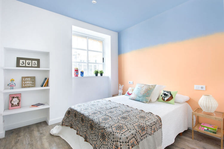 Como decorar una vivienda para alquilarla más rápido- dormitorio pared con pintura degradada