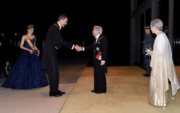 King Felipe VI and Queen Letizia attend the state banquet hosted by Japanese Emperor Akihito and Empress Michiko at the Imperial Palace. Letiza wore a navy blue gown and diamond tiara