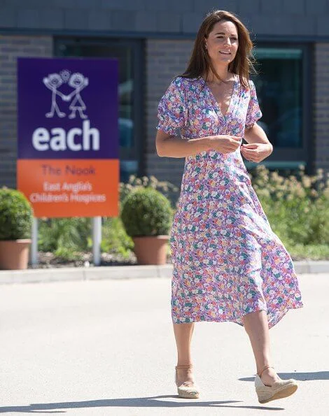 Kate Middleton wore a new pastel floral pattern dress by Faithfull the Brand, Russell and Bromley wedges, Accessorize hoop earrings
