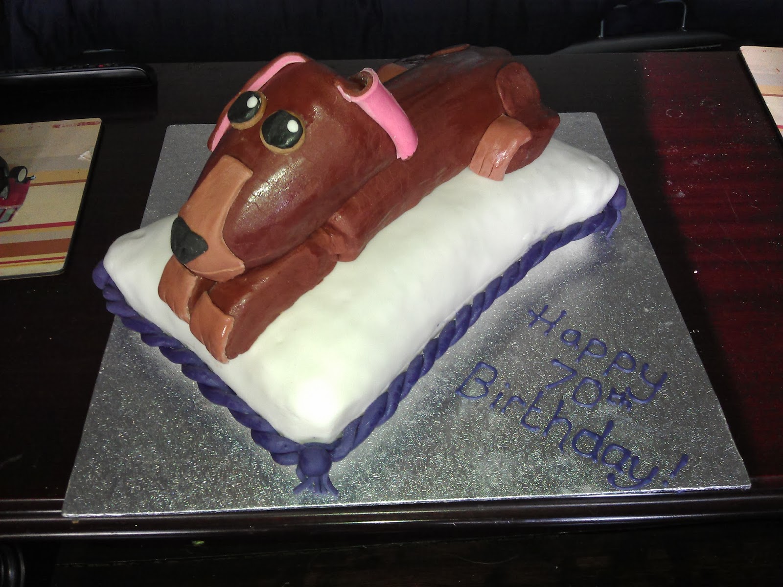 The BaKerry Sausage Dog on a Cake