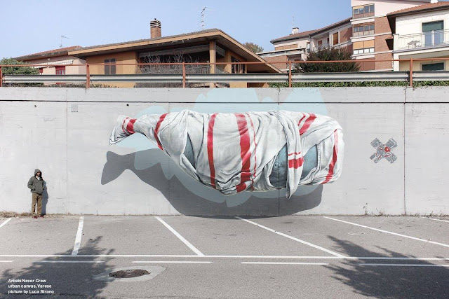 The streets of Varese in Italy and the Urban Canvas Street Art Festival just welcomed the good lads from NEVERCREW which created yet another fantastic piece of work featuring one of their signature whales.