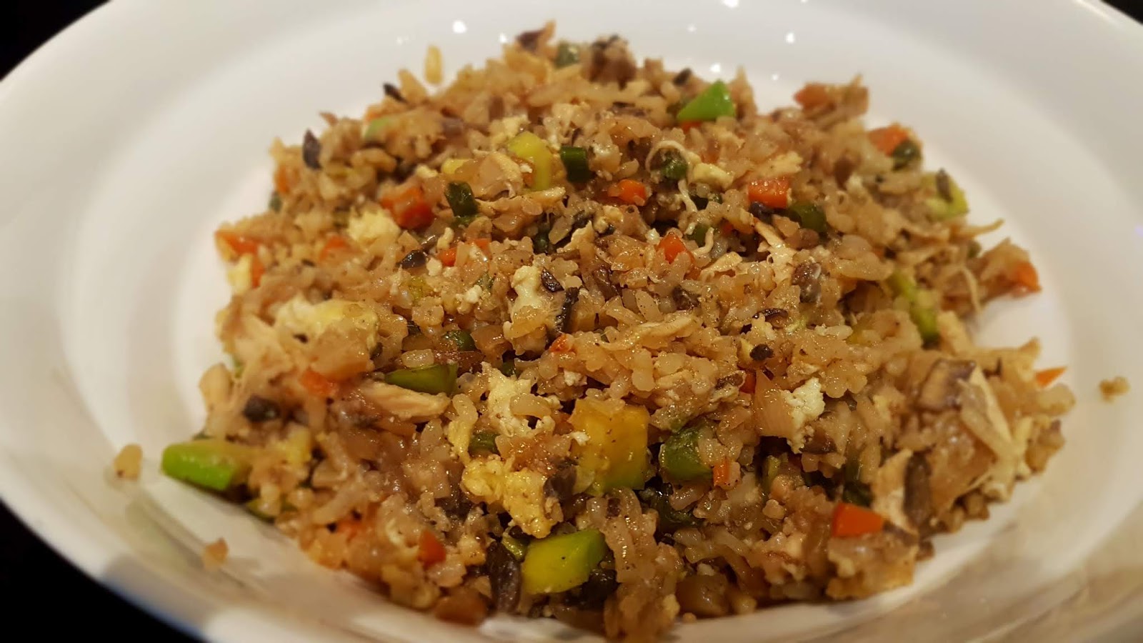 MUSHROOM FRIED RICE sauted in soy sauce, oyster sauce with fresh vegetables