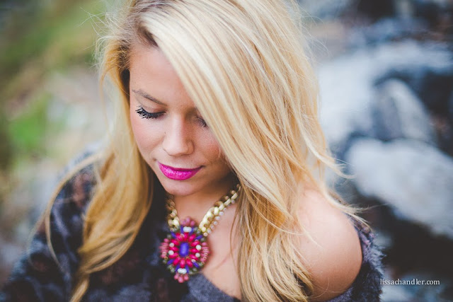 Leopard print sweater with accent necklace