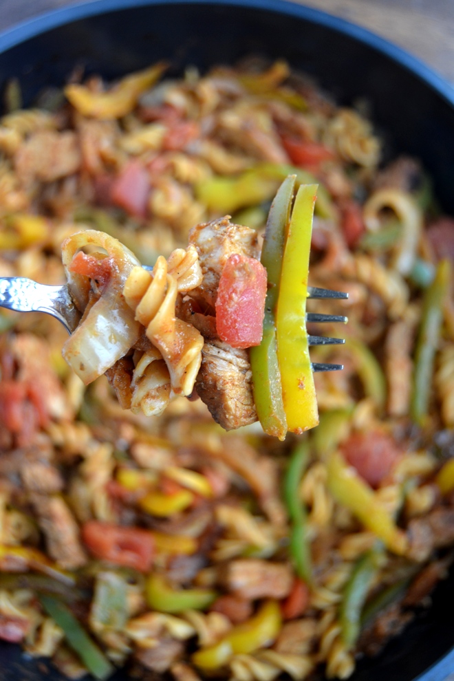 Cajun Pork Pasta is loaded with sauteed bell peppers and onions, Cajun seasoned pork and creamy Cajun noodles and is ready in 30 minutes! www.nutritionistreviews.com