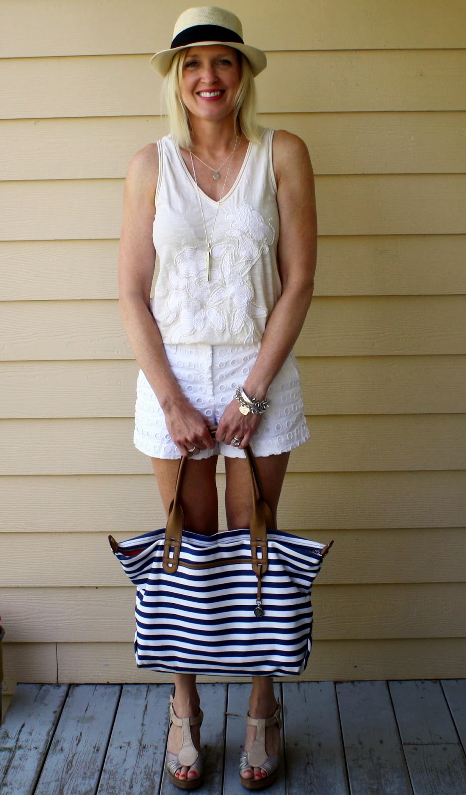 white eyelet shorts, ivory top and striped bag