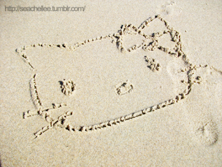 Hello Kitty Drawn In The Sand at the beach