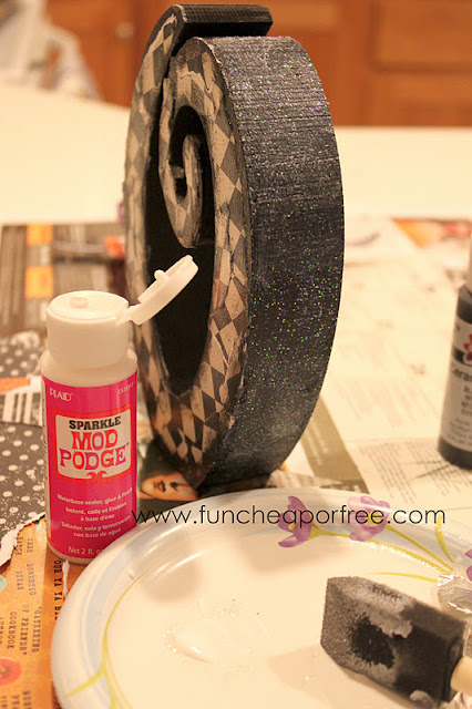 Mod Podge Sparkle on a wooden letter, from Fun Cheap or Free