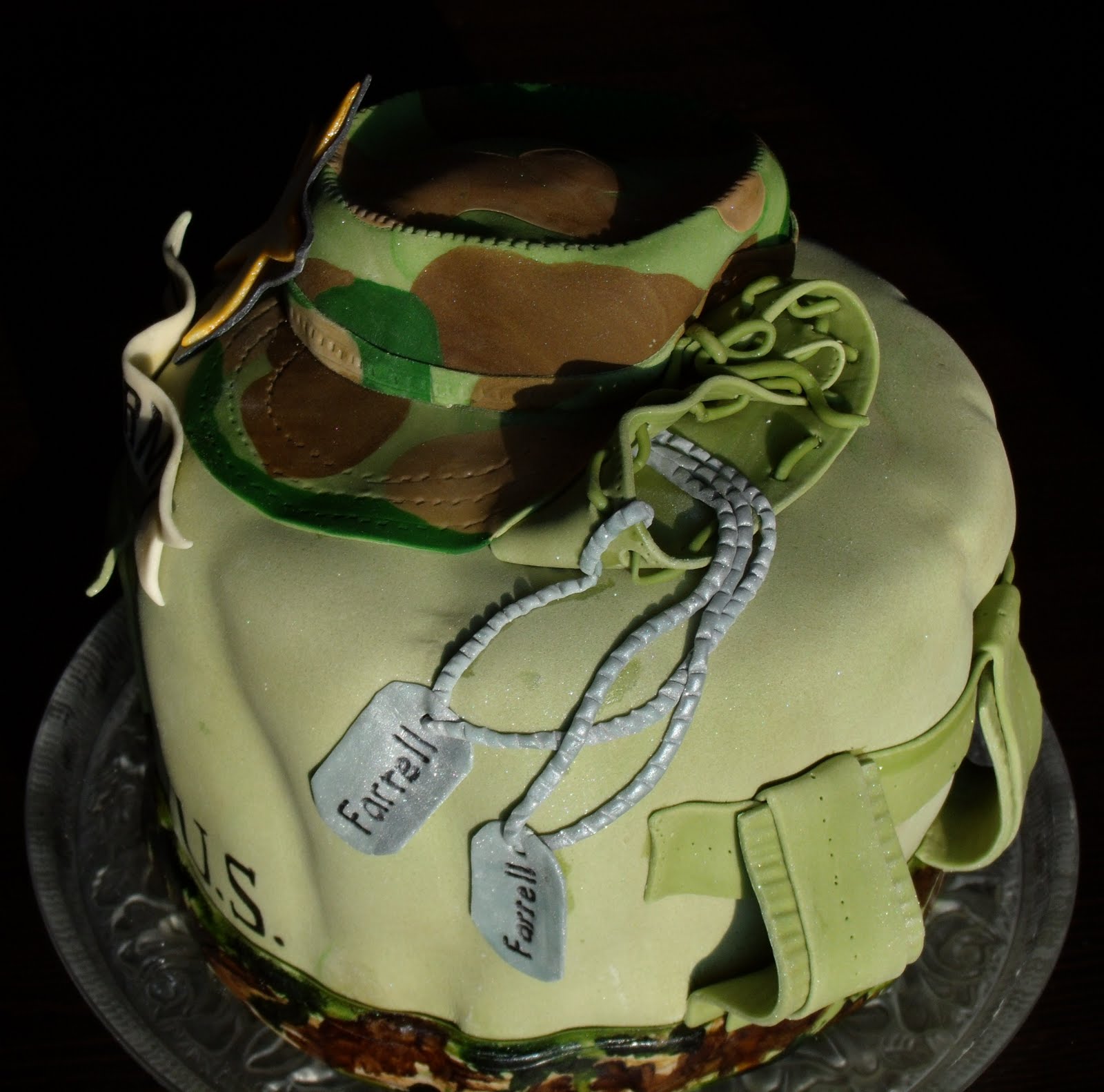 Cap is choc cake w it was an honor to design this cake for a young man ente...