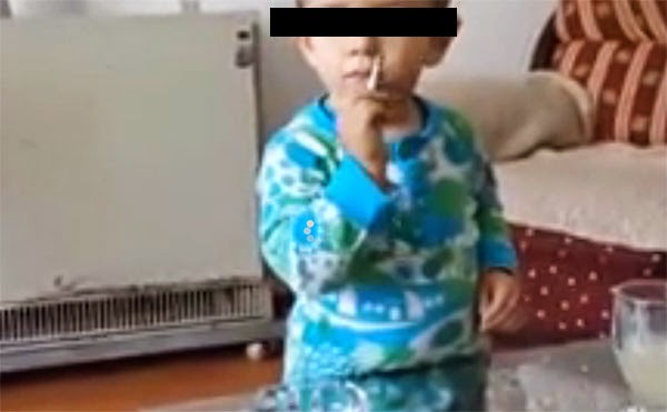 Shocking video of a 2-years old boy puffing on cigarette
