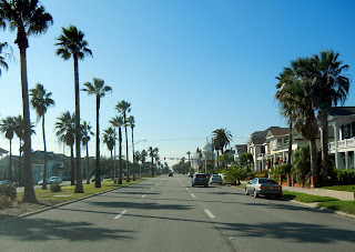 Driving on Broadway Avenue in Galveston, TX