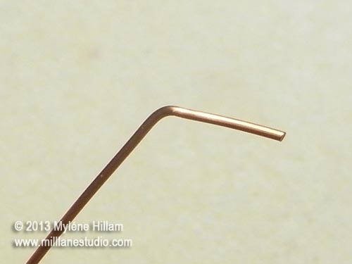 Copper wire bent at a 45° angle approximately 1cm from the end of the wire