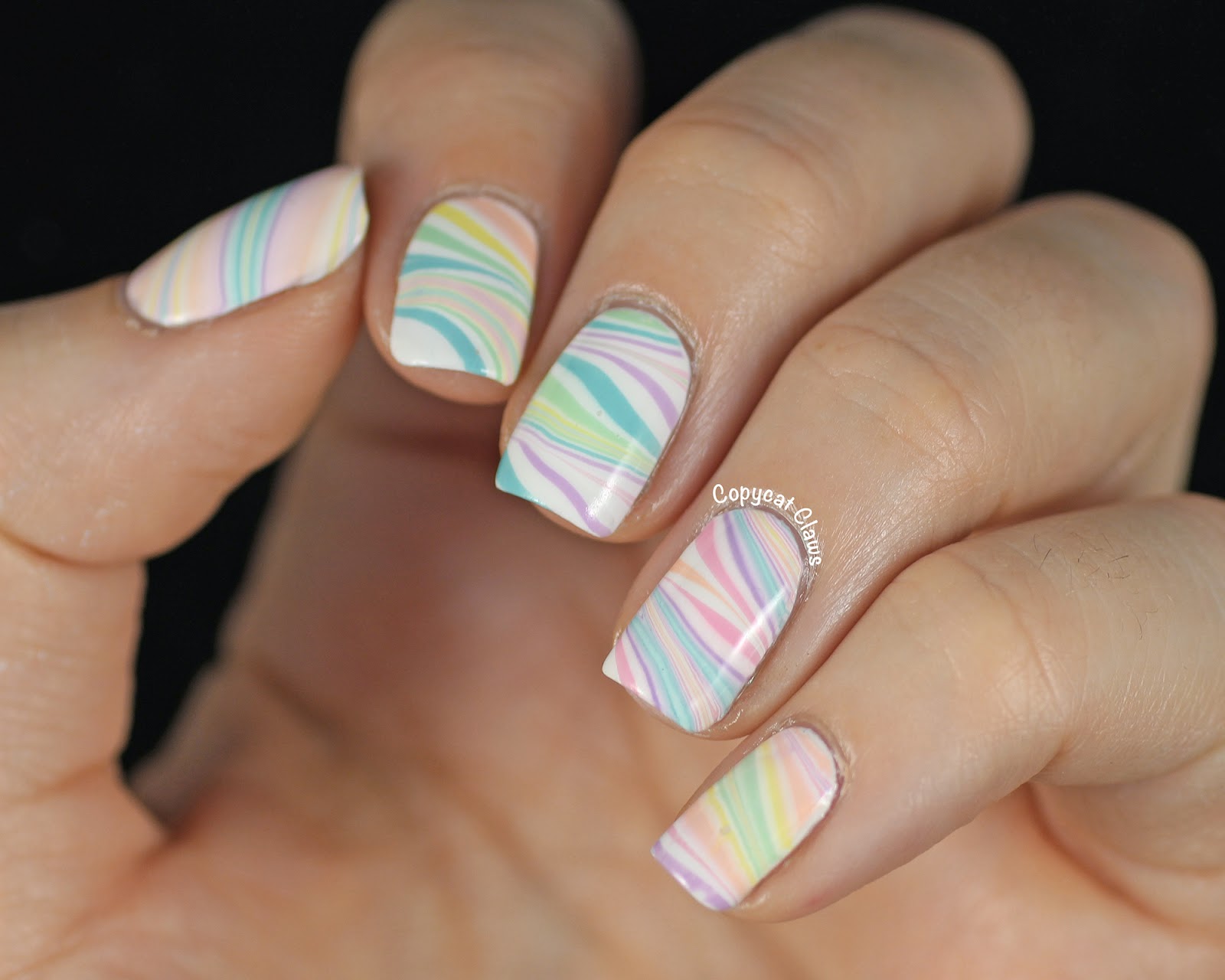 7. Blue and Pink Water Marble Nail Art Step by Step - wide 9