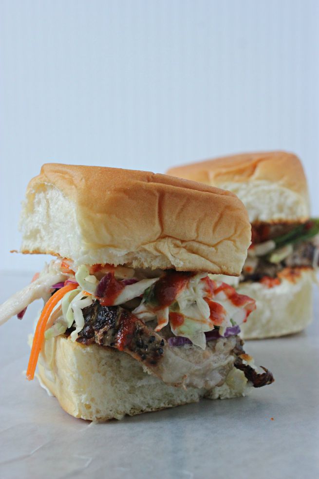 Marinated Pork Tenderloin Sliders with Pineapple Coleslaw.  Tangy.  Spicy.  Juicy.  Fast.  Easy recipe. 