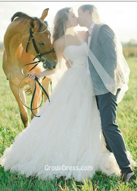 http://www.groupdress.com/strapless-white-tulle-a-line-fall-vintage-long-wedding-dress-1570.html