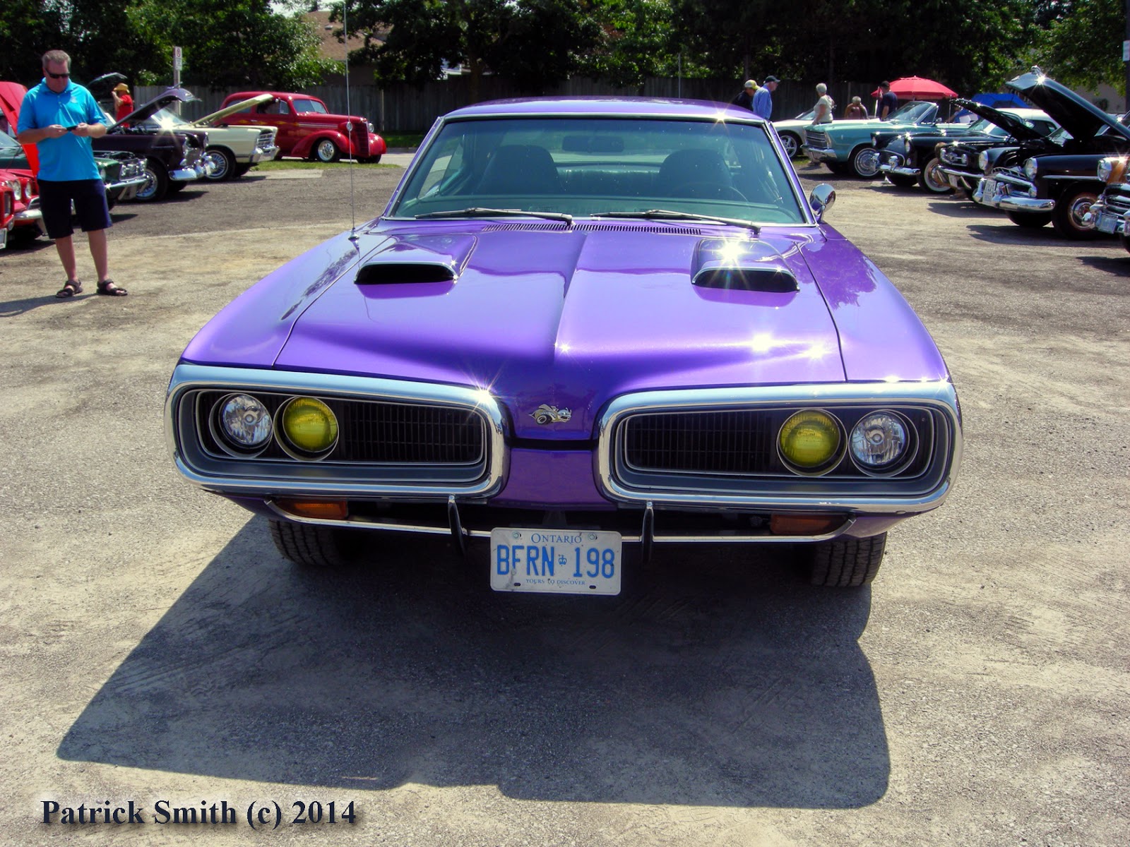 A Day Two vibe runs through the car with those period yellow road lamps.  Note the optional front bumper guards.
