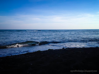 Black Sand And Calm Beach Water Horizon View In The Morning At Umeanyar Village North Bali Indonesia