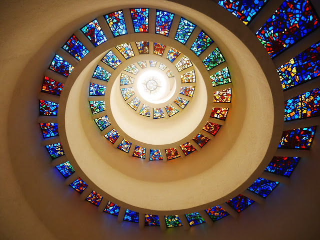 beautiful spiral of colorful stained glass inside thanksgiving square, dallas texas