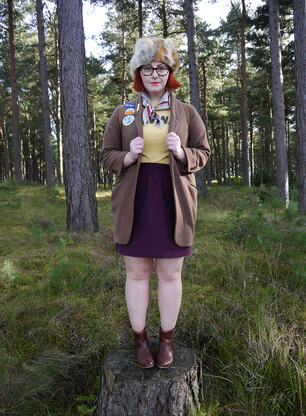 Moonrise Kingdom Unlikely Style Icon Outfit khaki scouts, Scottish blogger, style blogger, Moonrise Kingdom outfit, Moonrise Kingdom style, costume idea, Wes Anderson inspired outfit, Sam Moonrise Kingdom, scout style, Moonrise kingdom inspired outfit, vintage style, fur hat, Spex Pistols glasses, patches for adventurers, Lucky Dip Club patches, Olivia Mew cat scarf, vintage Brownies tshirt, Rag Trade Vintage, primark backpack, adventurer style