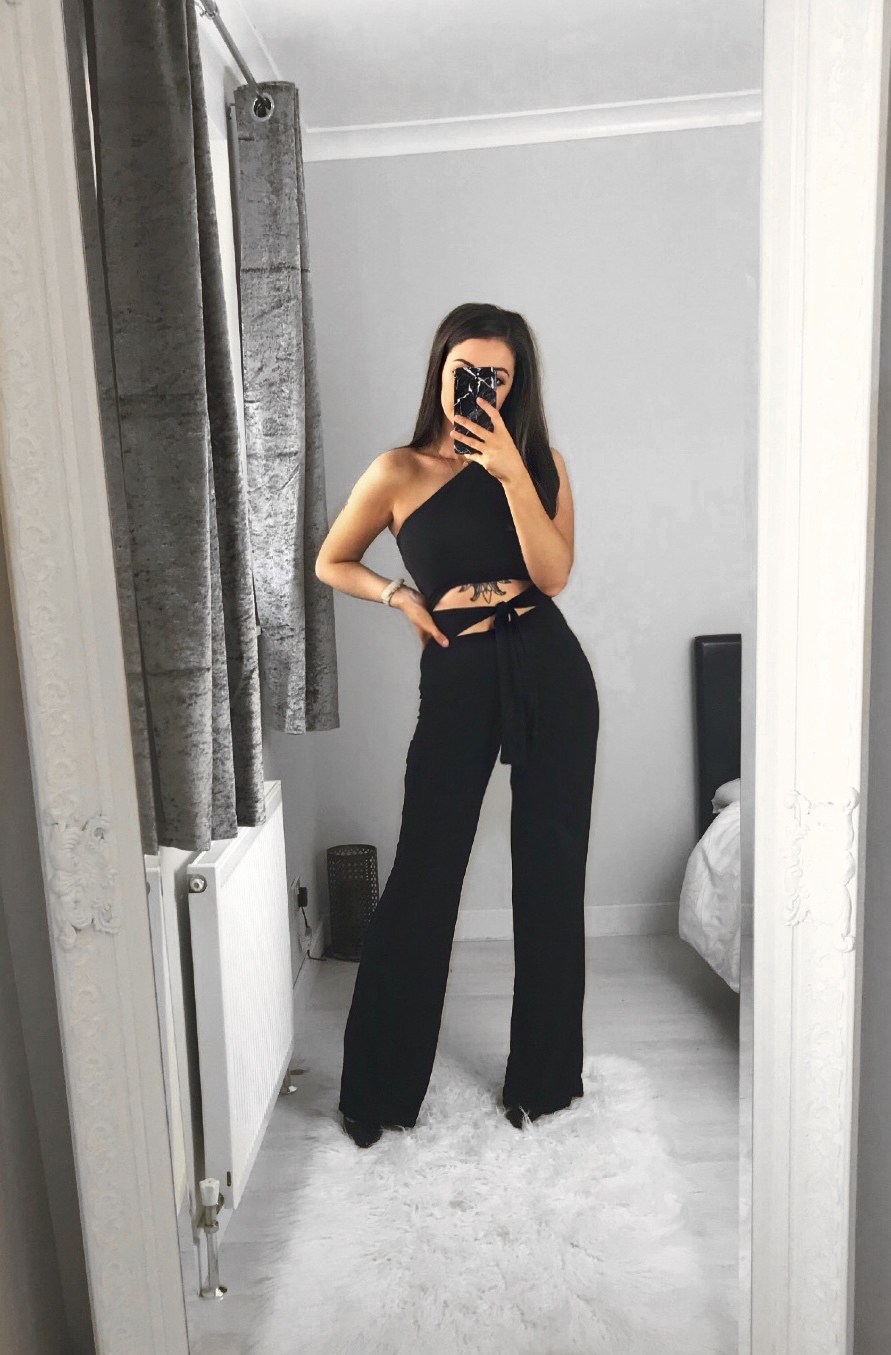 https://femmeluxefinery.co.uk/collections/jumpsuits/products/black-tie-front-one-shoulder-jumpsuit-heather