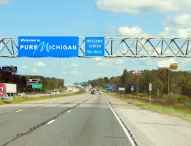 Michigan state line sign on Interstate 94 Michigan state line sign on Interstate 94