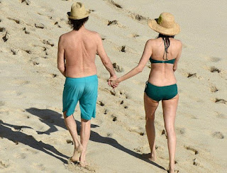 In an aqua trunks, Paul McCartney, 73, accompanied his beautiful 5 years lover, Nancy Shevell, 56, for walking in a green bikini as The couple seemed very enjoy the St Barts situation of beach on Sunday afternoon, December 27, 2015.