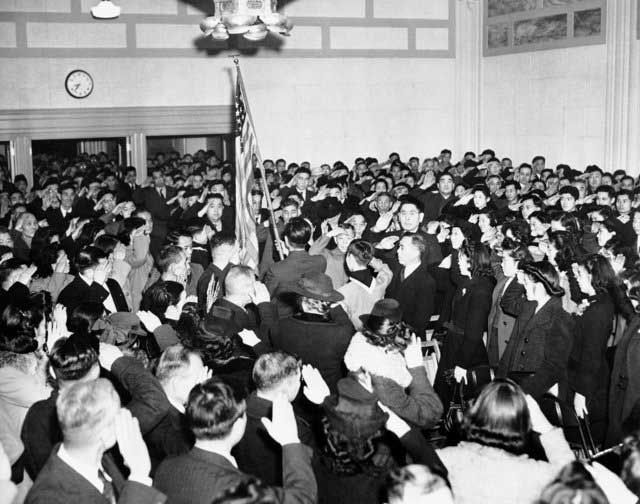 Japanese-Americans pledge allegiance to the US in Seattle, 24 December 1941 worldwartwo.filminspector.com